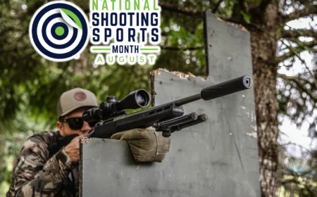 A man shooting a suppressed rifle celebrating national shooting sports month
