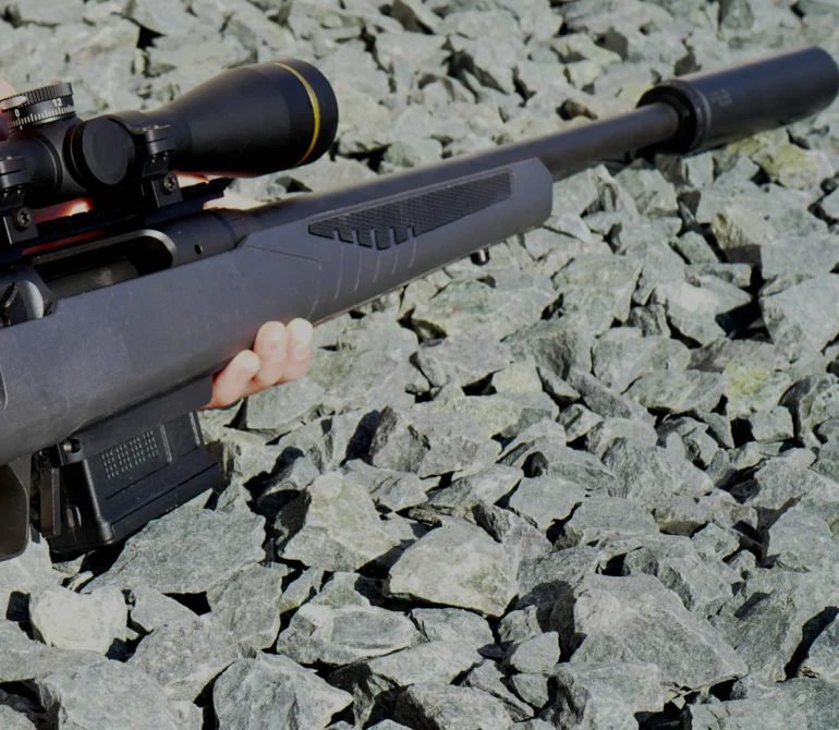450 Bushmaster Savage rifle with Dead Air Primal Suppressor and Leupold Scope.